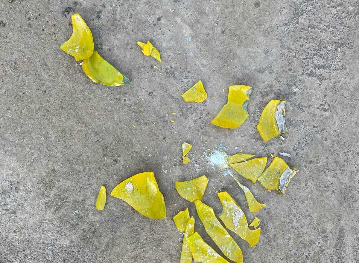Broken yellow crockery